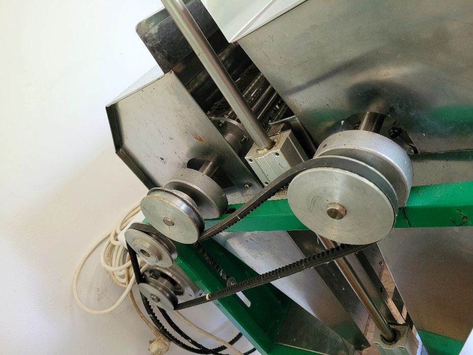 Descăpăcitor cu lamă orizontală