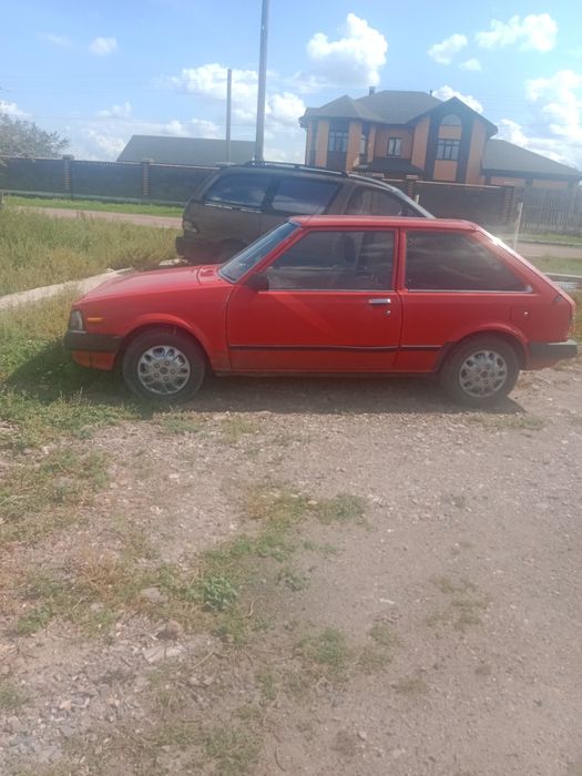 Мазда 323 старушка