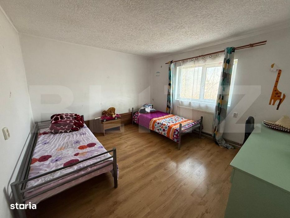 Casa de vanzare Paulesti – 4 camere, teren generos