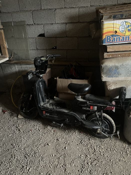 Электроный скутер