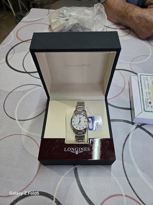 Longines quartz нов
