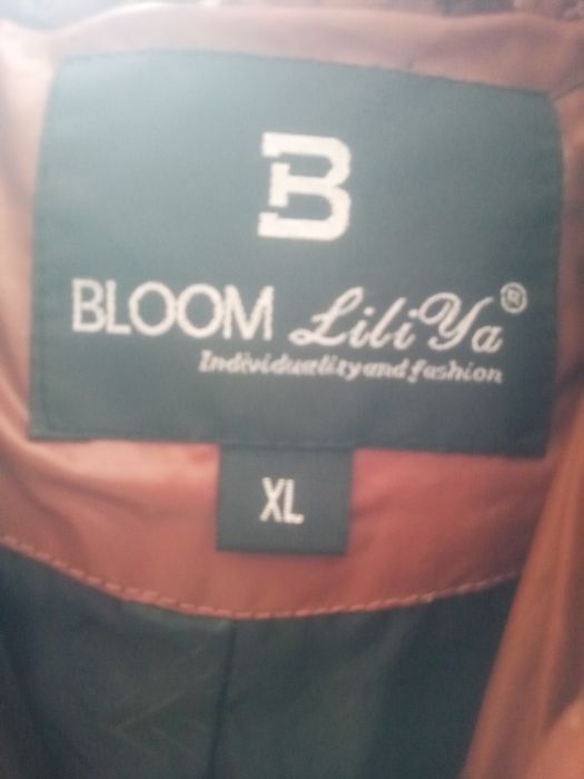 продам женский пуховик