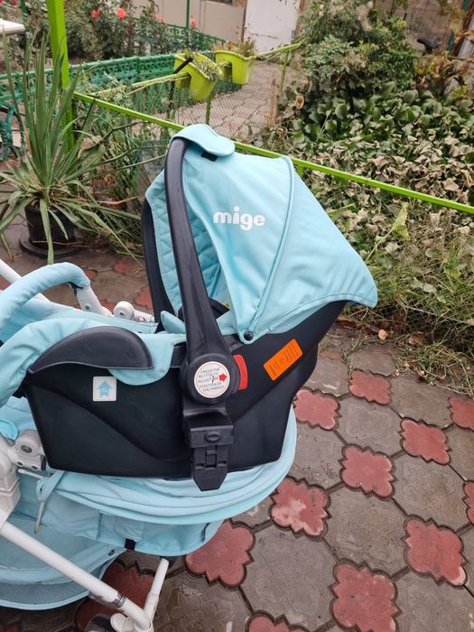 Продам коляску mige