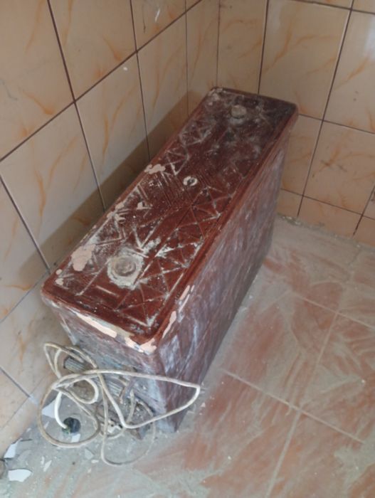 Soba  veche teracota și electrică