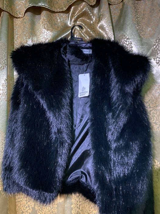 geaca de blana neagra