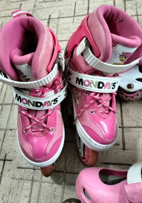 Роликовые коньки