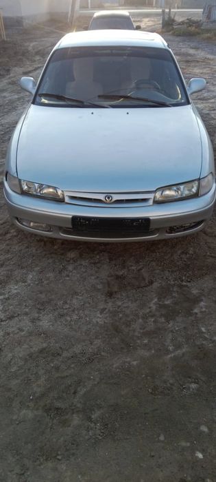 Мазда кронос 2обьем