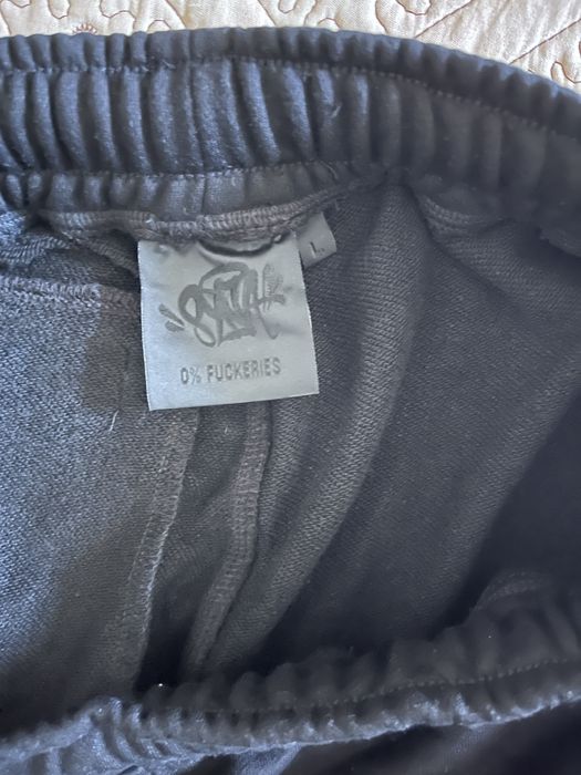 Pantaloni syna world