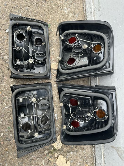 Задние стопы HELLA BLACK на BMW E34 БМВ Е34