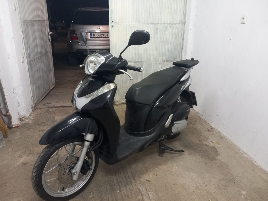 Honda sh 125 mode 2014г.