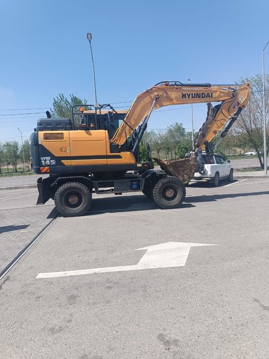 Экскаваторы в Алматы