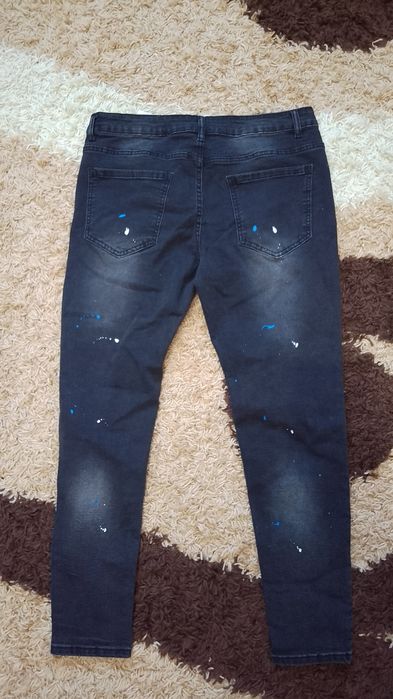 Pantaloni negri rupți de bărbați