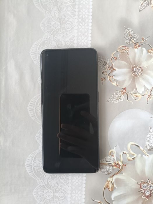 Телефон Oppo Reno7