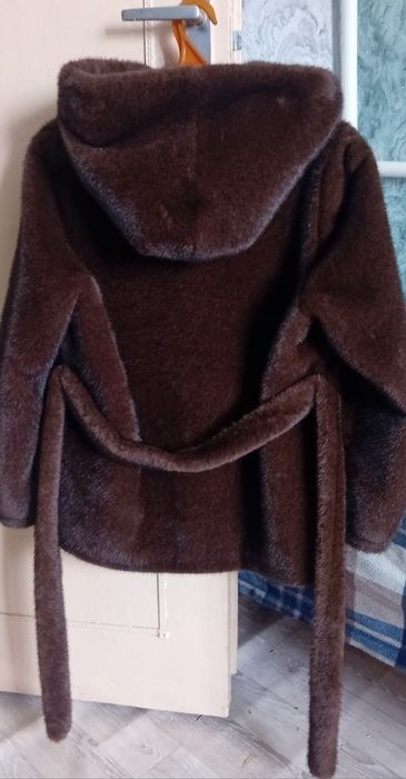 Полушубок новый.