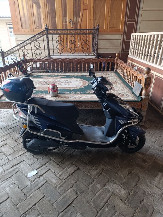 Срочно продам 500 доллар Скутер дугали 75_ 80 км бир заряд бн юради