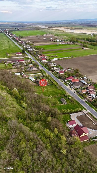 SE VINDE 1ha teren INTRAVILAN cu 25ml front stradal la E85, in Rosiori