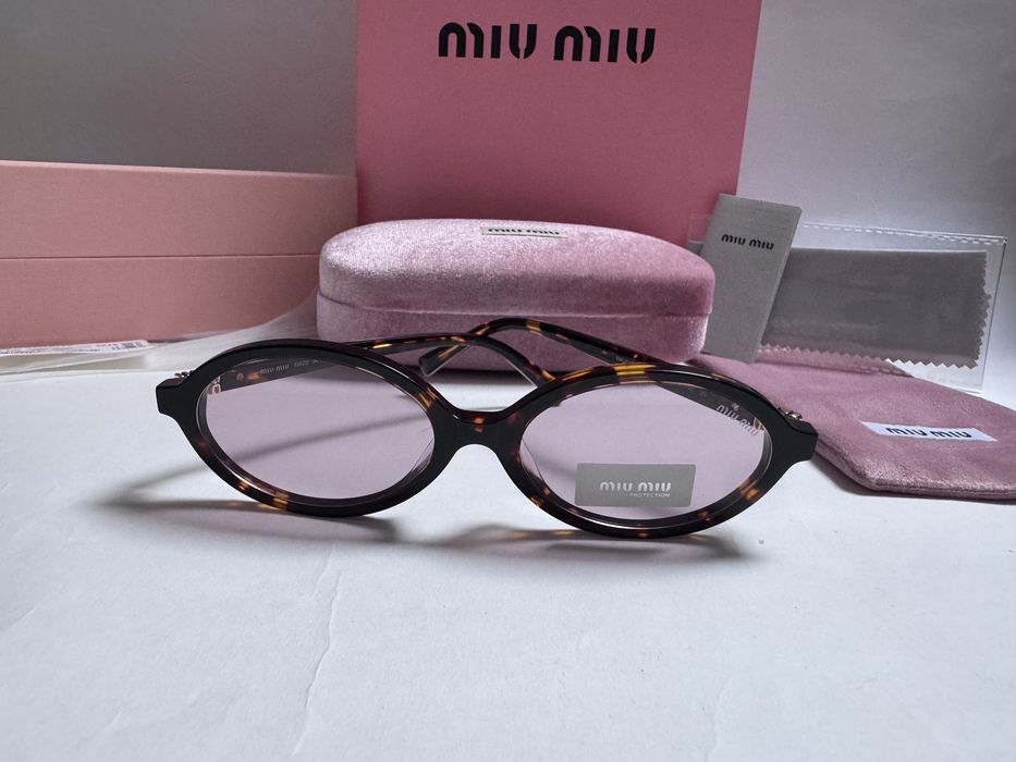 Ochelari de soare Miu Miu Oval SMU04Z 50-18 140, Noi