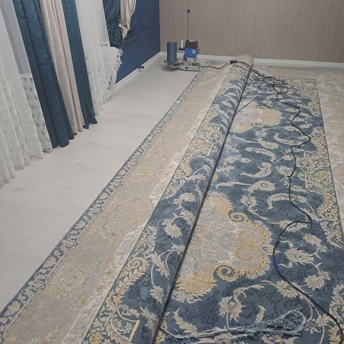 Gilam kesish va tikish