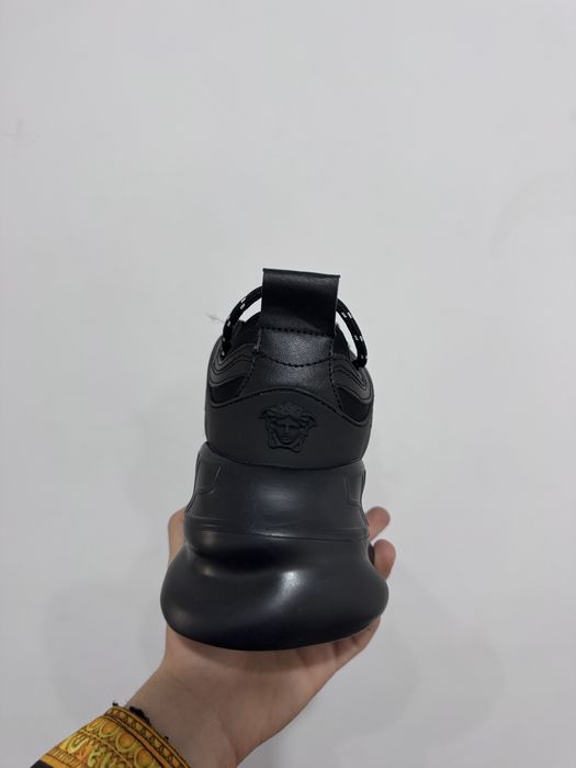 Versace chain reaction