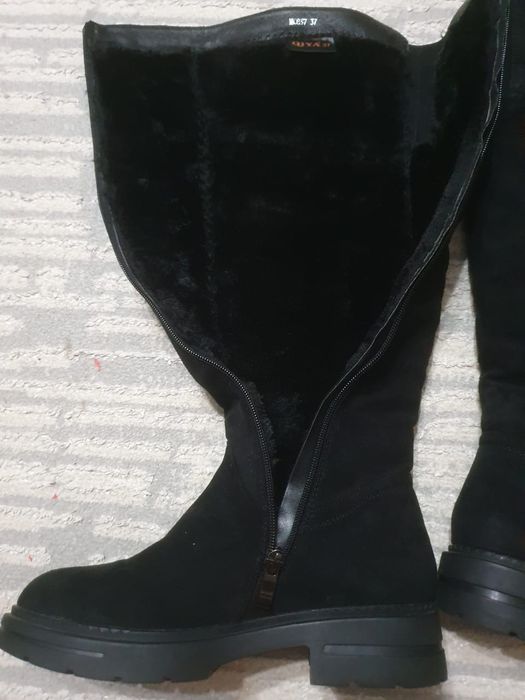 Продам сапоги новые