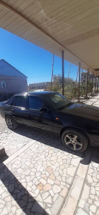 Nexia2  2009 холати яхши