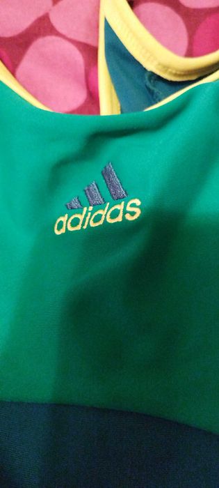 Costum de baie intreg cu spatele decupat, verde si galben de la: Adidas. Nou, cu eticheta!