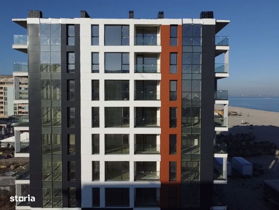 Finalizat | Apartament pe plaja cu vedere la mare in imobil premium
