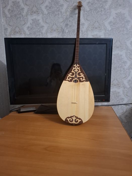 Продам домбыру новая