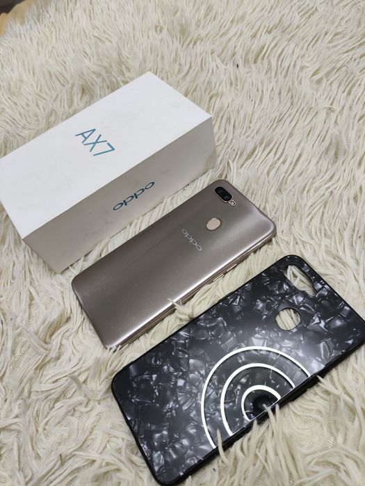 Телефон Oppo AX7