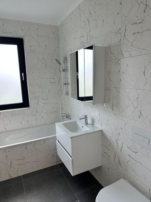 Apartament cu 3 camere , cu grădină proprie 100 mp / Sânpetru / 2 parcări.