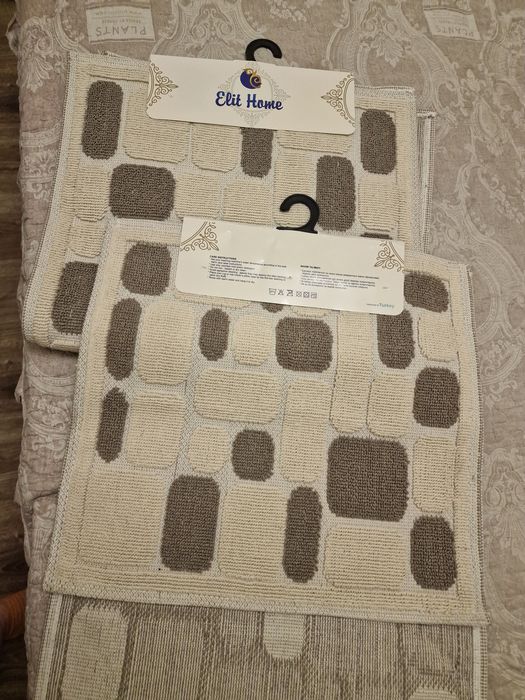 Продам новые коврики в ванную