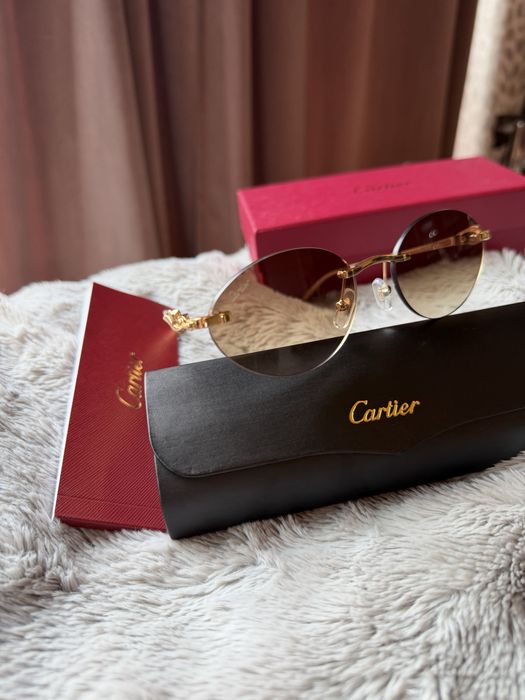 Ochelari de soare Cartier – model rotund fără ramă, auriu, unisex