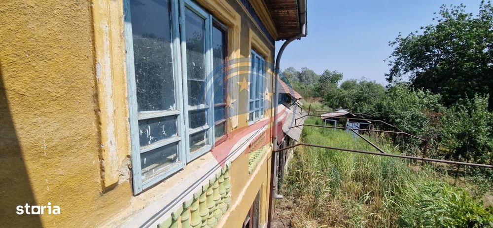 Casa de vanzare  5 camere + teren 2200 mp in loc. Calopar satul Bazdan