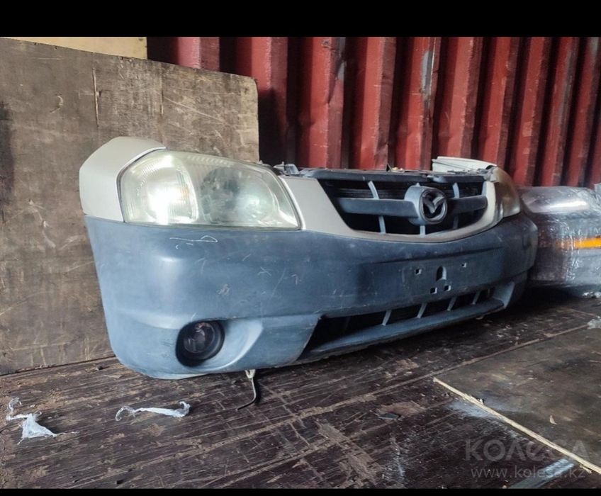 Передняя часть морда Мазда трибут