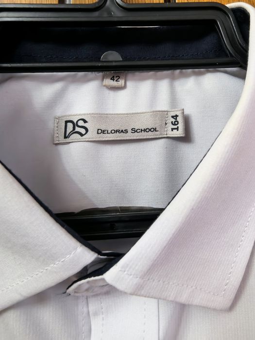 Продам рубашку на мальчика рост 164см