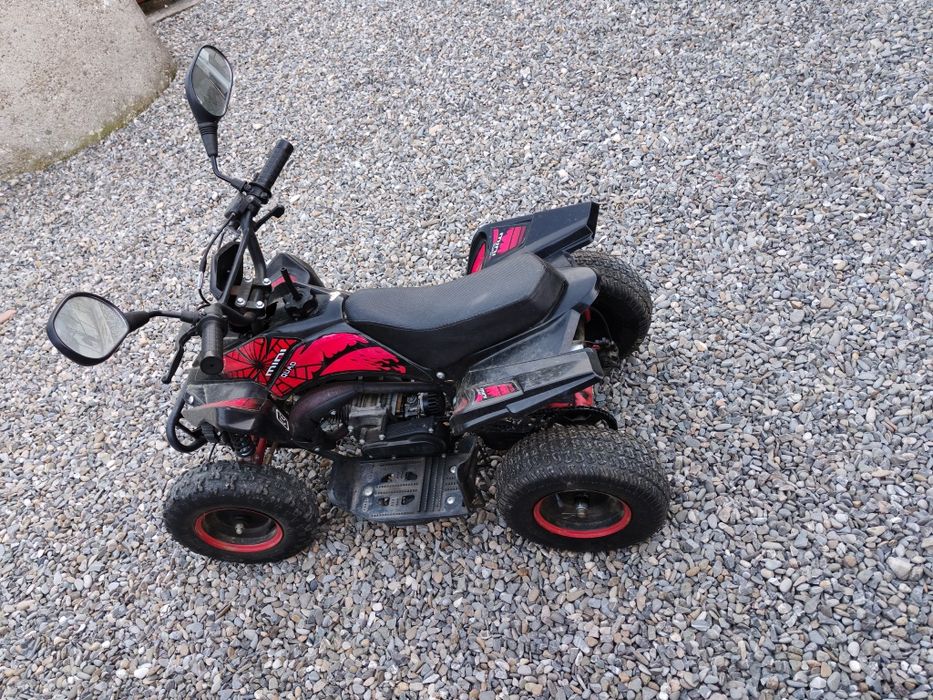 Atv-u 49cc pentru copii 7-12ani