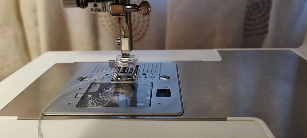 Mașină casnică de cusut Singer Supera 5523