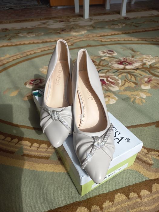 Новые стильные туфли