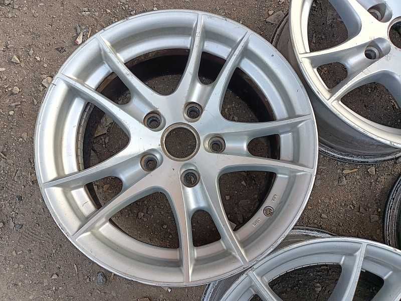 Продам оригинальные легкосплавные диски на BMW 5 e34