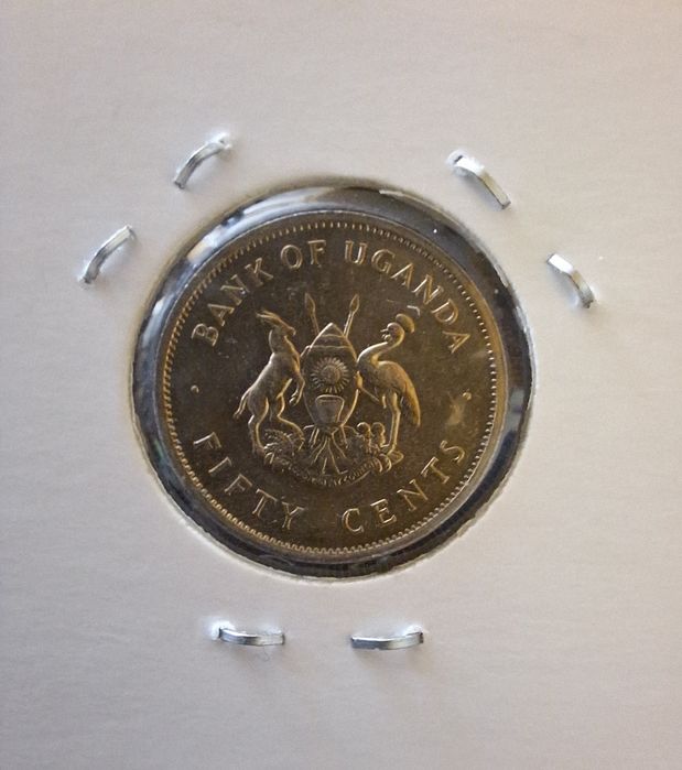 Vând monedă pentru colecționari, "Fifty cents Uganda"