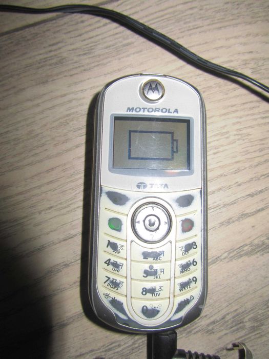 Продам сотовый телефон Motorola W200 !