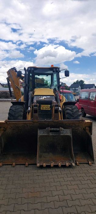 Buldoexcavator Caterpillar