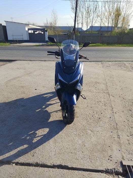 Скутер т Макс Китай