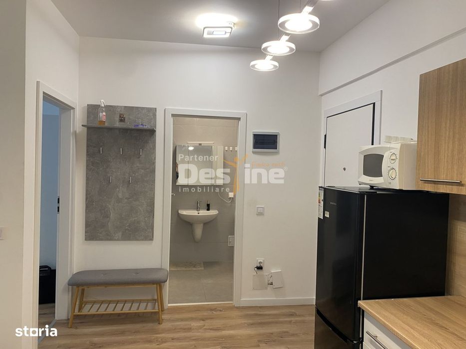 Studio la  etaj intermediar, cu balcon si parcare subterana, situat in