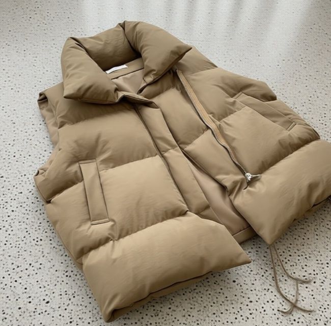 Новая жилетка продам