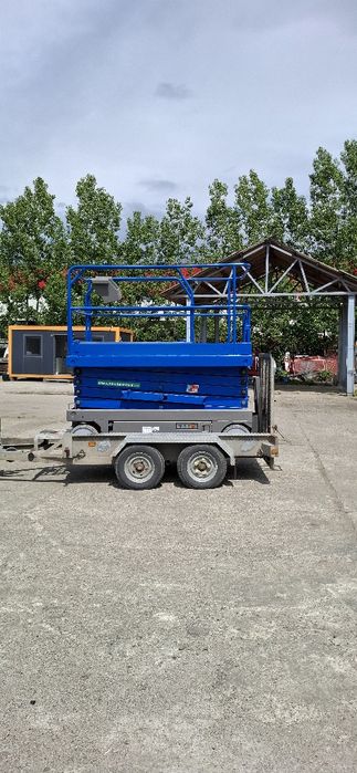 Nacela electrica de vanzare cu remorca, UpRight X32N 12m, latime 1,2m, an 2009, second hand, 7700 euro, 4 bucati disponibile