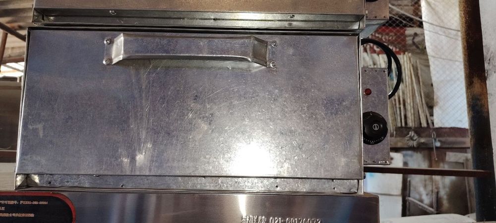 Duxovka somsa uchun stol perashka stilaj orasida moyka rakvina