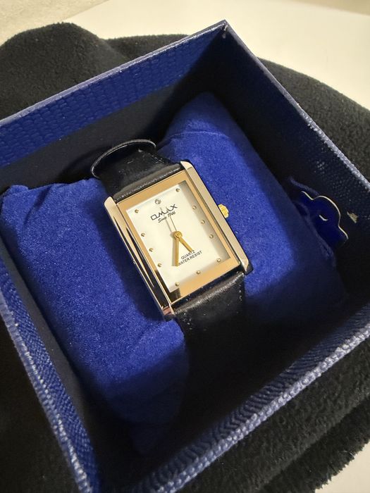 Часы омакс новые продам