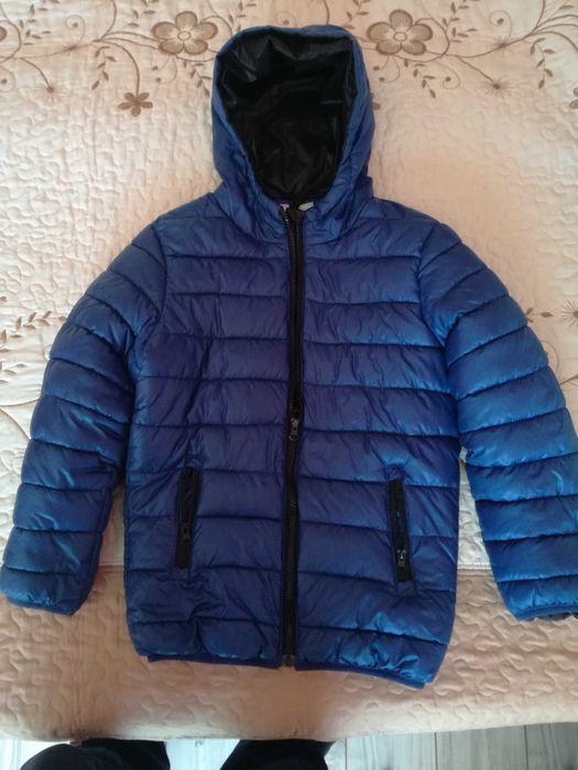 Продавам светло синьо детско зимно яке-DONG