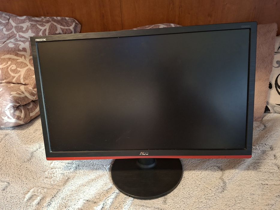 AOC G2460PF de 24 de inch, conceput pentru gaming.     Ecran: Panou TN de 24 inch cu rezoluție Full HD (\(1920\times 1080\) pixeli).  Performanță: Rat